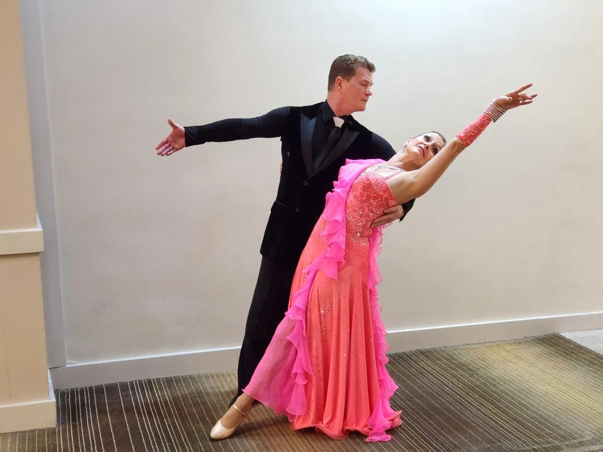Couples dancing at a ballroom dance centre