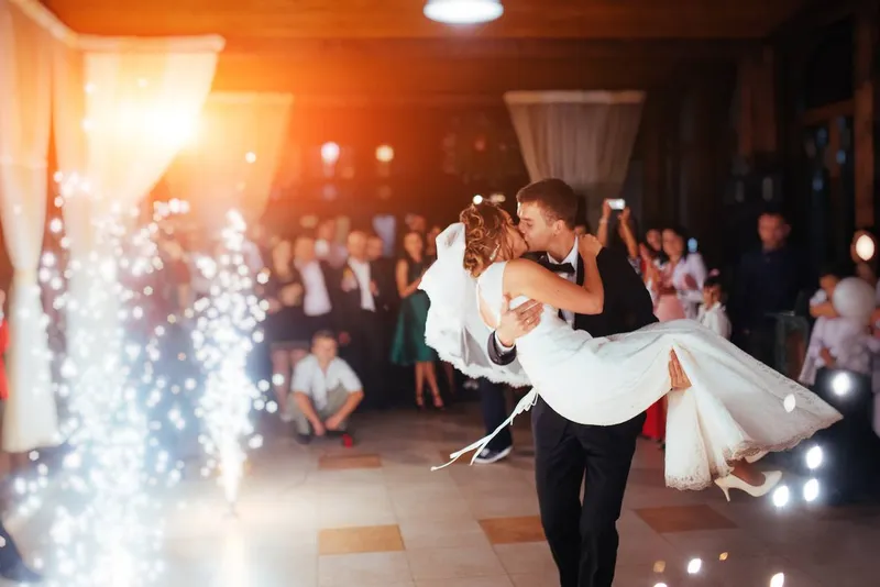 A couple’s first dance surrounded by sparklers